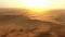 Drone, desert and sand landscape, sunset sky and beauty in nature on dry land, horizon and Africa sahara. Hill and