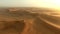 Drone, desert sand and landscape with wind in summer sunshine, nature and outdoor copy space. Earth, dust and horizon