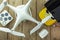 Drone equipment with Remote control on wood background flat lay composition