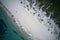 Drone field of view of of footprints in the sand and water from above beach  in Western Australia