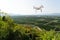 Drone flies over agricultural valley