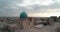 A drone flies over the famous Mir I Arab Madressa memorial complex in Bukhara at dawn