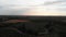 The drone flies slowly over fruit orchards