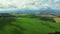 Drone Flight above Yellow Wheat Field Slovakia Tatra Mountains in the background