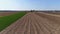 Drone Flight over Agricultural Fields and Wheat Fields being Harvested