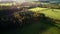 Drone flight over autumnal coloured countryside