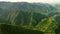 Drone flight over green tropical rainforest