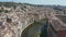 Drone flight over roofs of colorful Girona houses