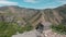 Drone fly forward Garni pagan in mountains. The hellenistic temple in Armenia