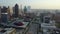 Drone fly view of Dallas city center buildings and traffic by evening, USA