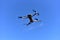 Drone flying in the air over an agricultural field. Quadcopter with HD video and a 48MP Camera 4K Video during flight. Copter for