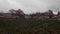 Drone flying by massive red rocks in Sedona during cloudy day