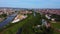 Drone flying over fair Dult in Regensburg, Bavaria, Germany with ferris wheel and beer tentson sunny day