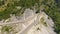 DRONE: Flying over a viaduct and mountain road tunnel in Dolomites, Italy.