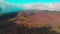 Drone flying over a volcano crater