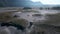 Drone follow up shot of a Off-Roading vehicle in a vast desert land