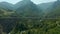 Drone footage of arched bridge of Djurdjevic in mountain of Montenegro over the Tara river