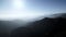 Drone footage of San Gabriel Mountains, silhouette of Mount Baldy, California