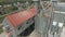 Drone from a height flies around a grain dryer on an agricultural farmstead