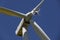 Drone hovering over wind turbines, renewable energy