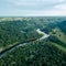 drone image. aerial view of forests and river Gauja in the middle in summer day. Latvia, Sigulda municipality