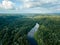 drone image. aerial view of forests and river Gauja in the middle in summer day. Latvia, Sigulda municipality