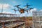 Drone inspection, Operator inspecting construction site