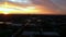 Drone landscape view of a urban neighborhood on the west side of Chicago during sun set.