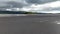 Drone landscape view of wetland with mountain on a cloudy day