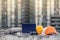 Drone, laptop and protective helmet at construction site