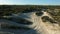 Drone, Namibian desert and 4x4 car driving on sand path, landscape or safari adventure. Aerial, road trip and suv off