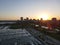 Drone over harbor with cityscape at seaside in Wisconsin at sunset