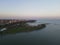 Drone over harbor with cityscape at seaside in Wisconsin at sunset