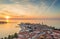 Drone panorama of Croatian coastal town Porec with harbor and promenade during sunrise