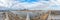 Drone panorama over St. Louis skyline and Mississippi River with Gateway Arch during daytime