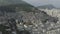 Drone, panoramic footage of favelas on the hills of the city of Rio de Janeiro