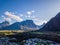 Drone Photo of the City Ã…ndalsnes in Norway on Sunny Summer Day with Mountains, Fjord and Port in the Background