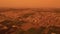 Drone point of view, panoramic scenery spanish town during Calima sandstorm fine dust storm from Sahara desert
