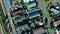 Drone, property infrastructure and the neighborhood of a residential area with traffic driving on a street. House roof