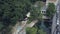 A drone pullback shot of a river and a bridge crossing it.