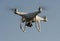 Drone quadcopter hovering in flight