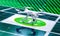 Drone is ready for take off to fly high in air, to take photos and record footage from above. White quadcopter with four