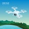 Drone with remote control flying over nature landscape. Aerial drone with camera taking photography and video concept
