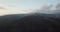 Drone rises above the snowy mountains