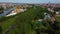 Drone rising over the fair Maidult in Regensburg, Bavaria, Germany with ferris wheel and beer tents on sunny day