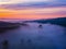 Drone\\\'s Eye View: Serene Sunrise Over Misty River and Woodland Landscape