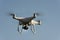 Drone set against a blue sky