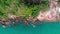 Drone shooting. Aerial photography. Vertical top view of the stone coast of a tropical island. Perfect turquoise water. Stones of