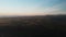 Drone shooting. Forest landscape, mountains, urban village. Sunset, Caucasus.