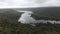 Drone shot aerial view scenic landscape of a big river and nature wood and forest